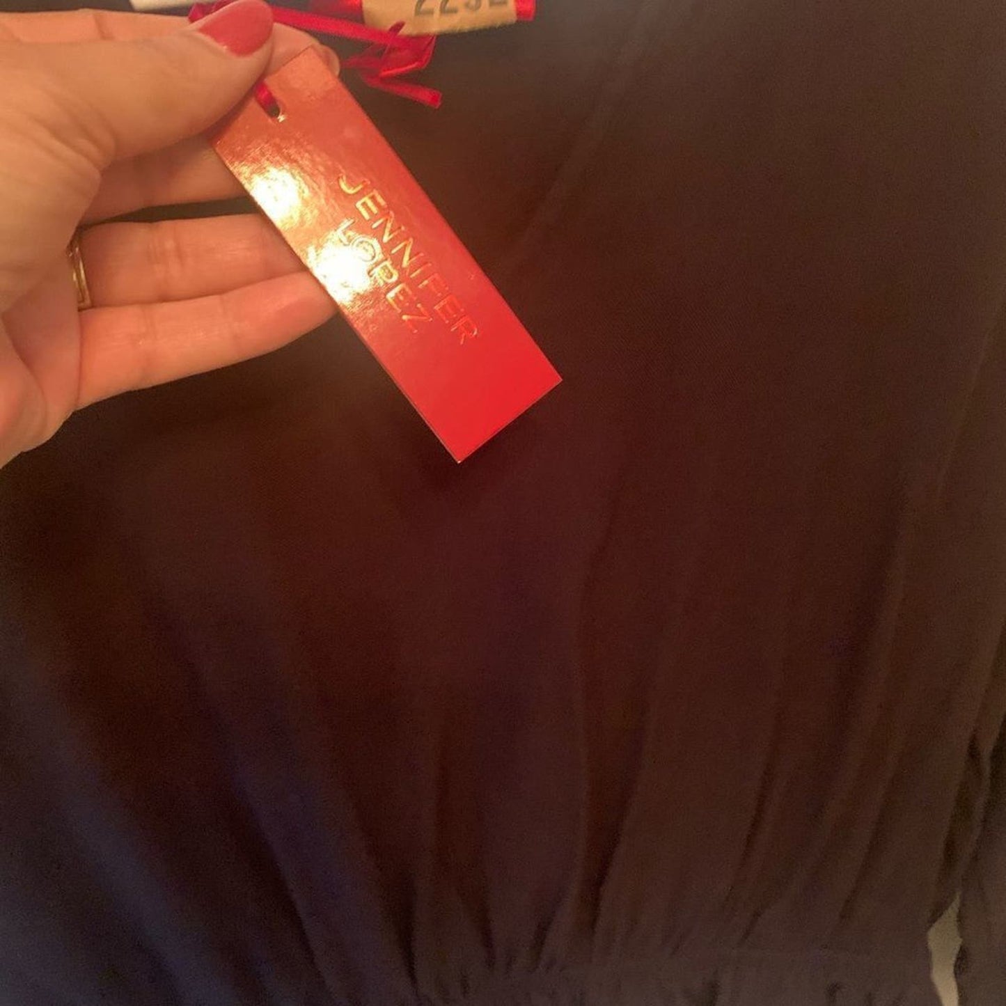 Jennifer Lopez black long sleeve blouse M