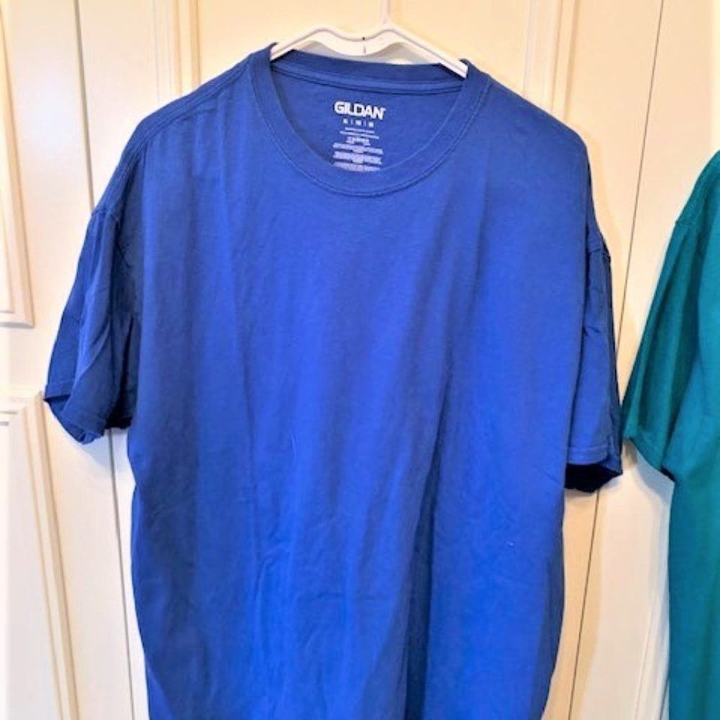 set 2 blue/green short sleeved  T-shirts