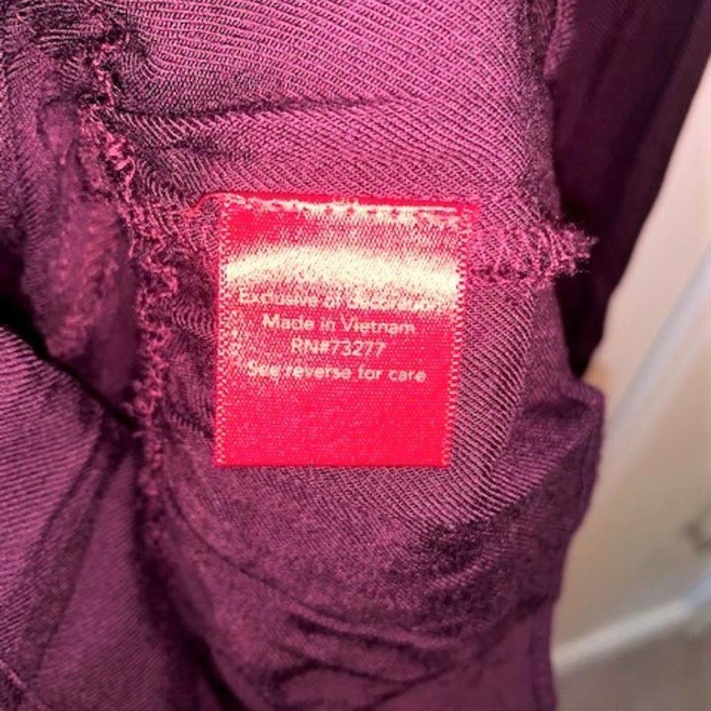 Jennifer Lopez maroon long sleeve blouse M