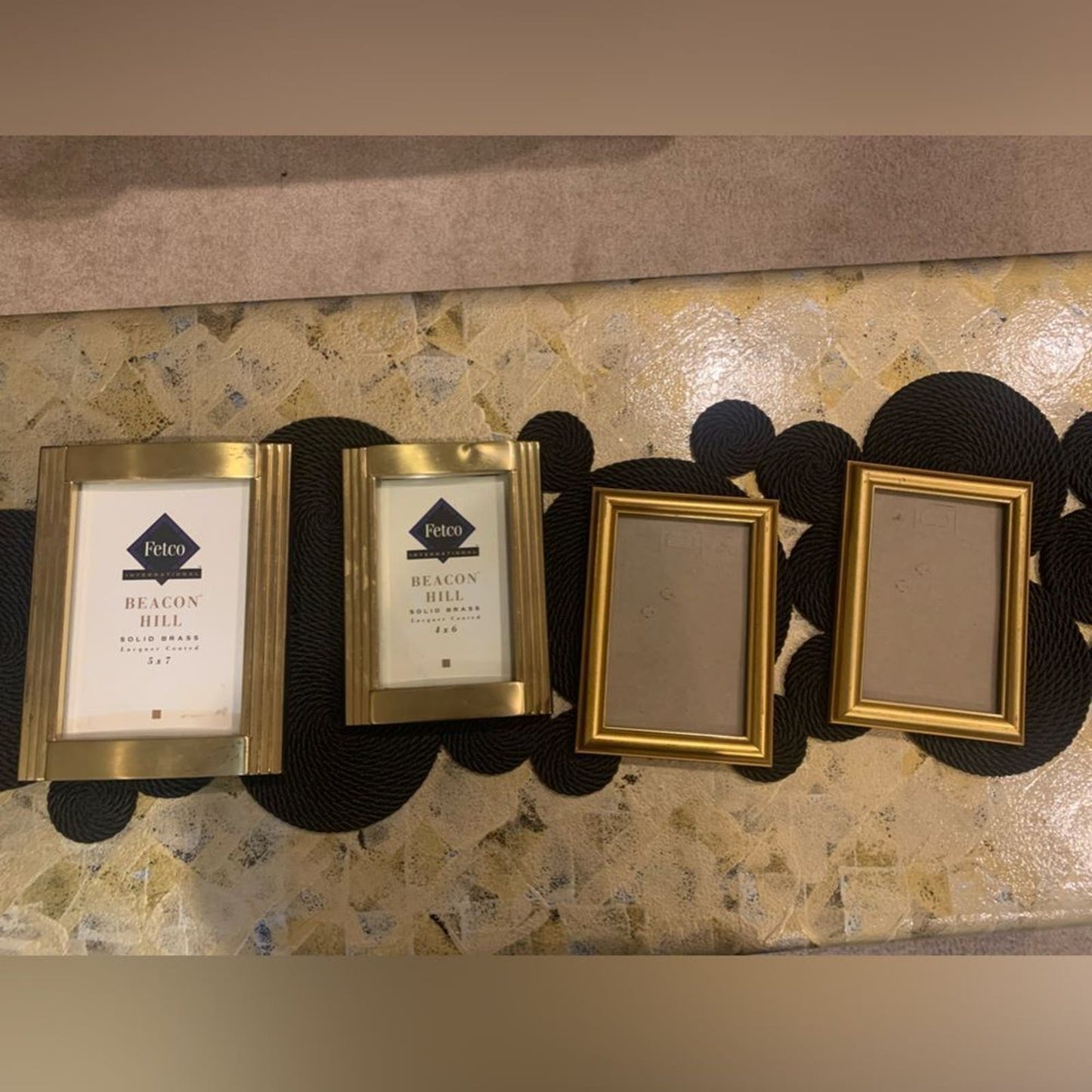 Elegant Set of 4 gold/brass tone picture frames - timeless charm!