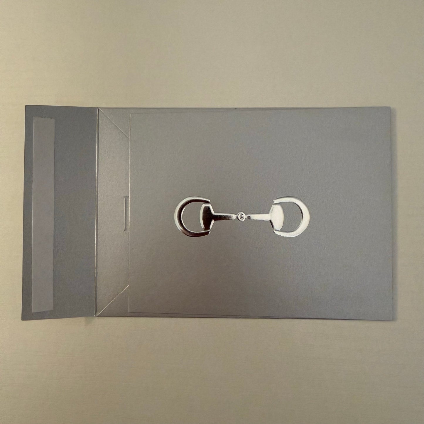 Gucci Metallic Silver Embossed Logo Envelope Gift Card Holder Horsebit