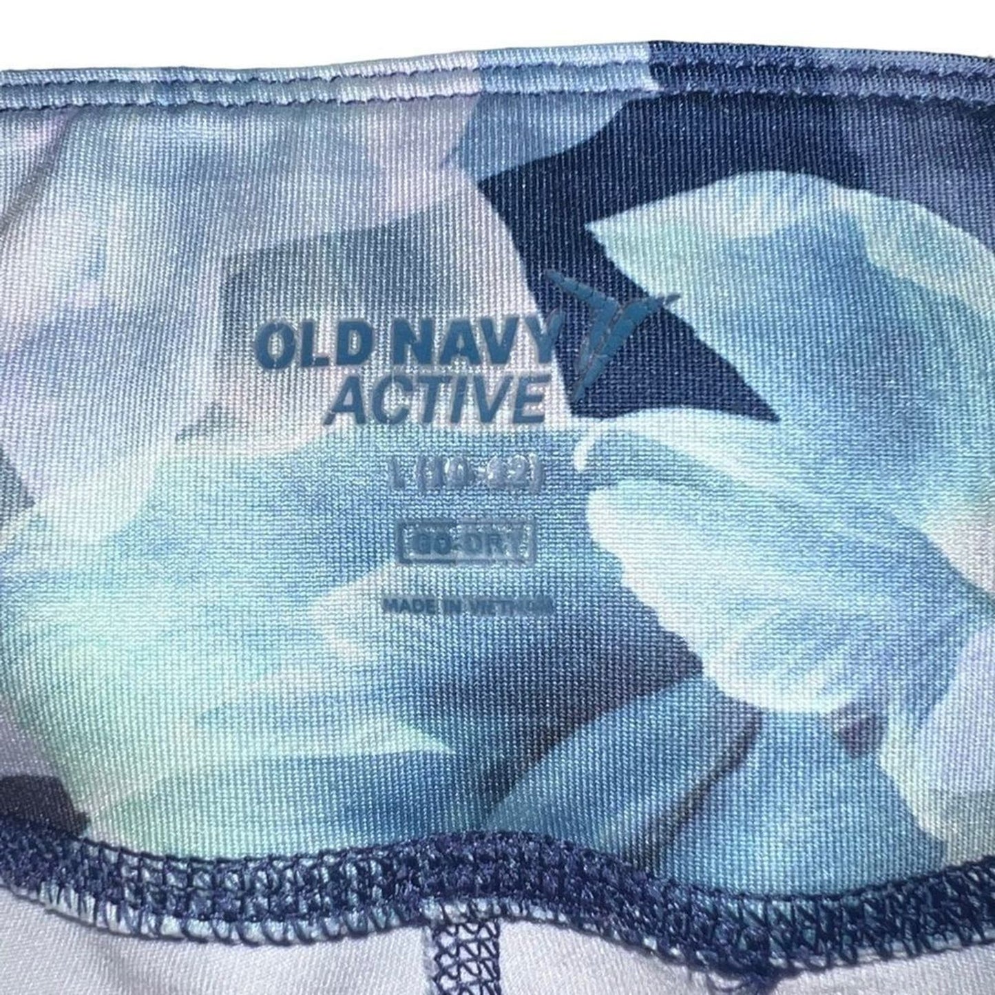 Old Navy purple active floral leggings sz 10-12 EUC