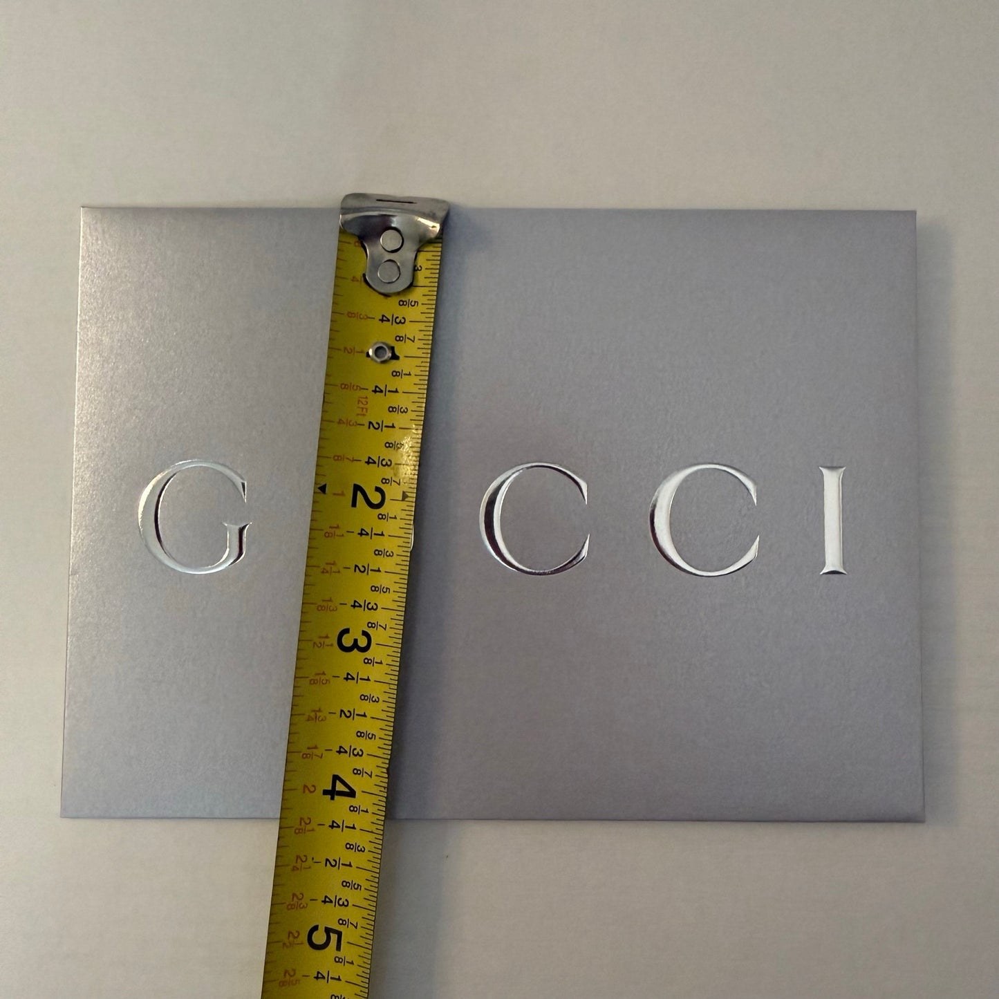 Gucci Metallic Silver Embossed Logo Envelope Gift Card Holder Horsebit